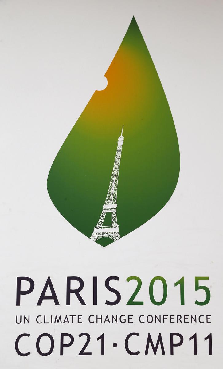 The logo of the COP21 is pictured on a banner promoting the Climate conference and hanging outside the French Foreign Ministry in Paris. Monday, Nov.2, 2015. The Paris conference, known as COP21, runs Nov. 30-Dec 11. (AP Photo/Jacques Brinon)