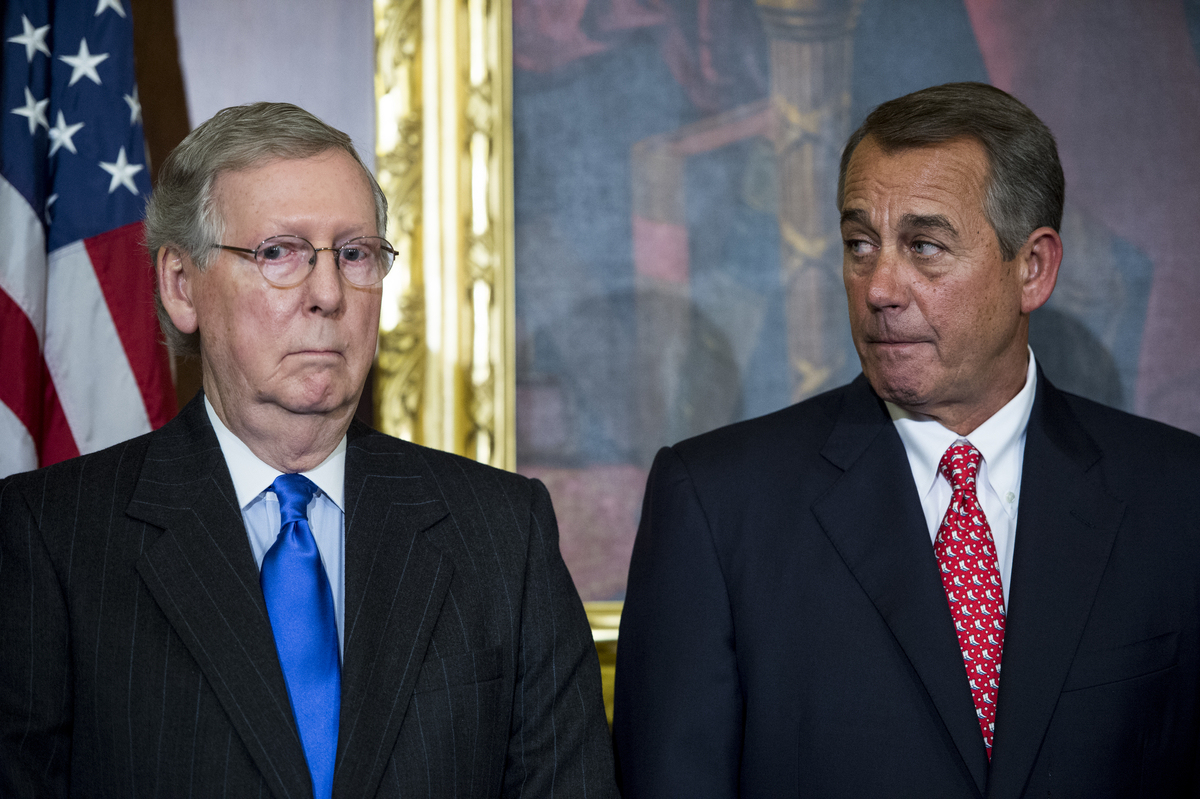 UNITED STATES - FEBRUARY 10: Senate Majority Leader Mitch McConnell, R-Ky., left, and Speaker of the House John Boehner, R-Ohio, participate in the ceremony to sign H.R.203, the "Clay Hunt Suicide Prevention for American Veterans Act." in the Capitol on Tuesday, Feb. 10, 2015. (Photo By Bill Clark/CQ Roll Call)