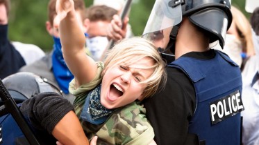 Police-Riot-Protest-Woman-Yelling